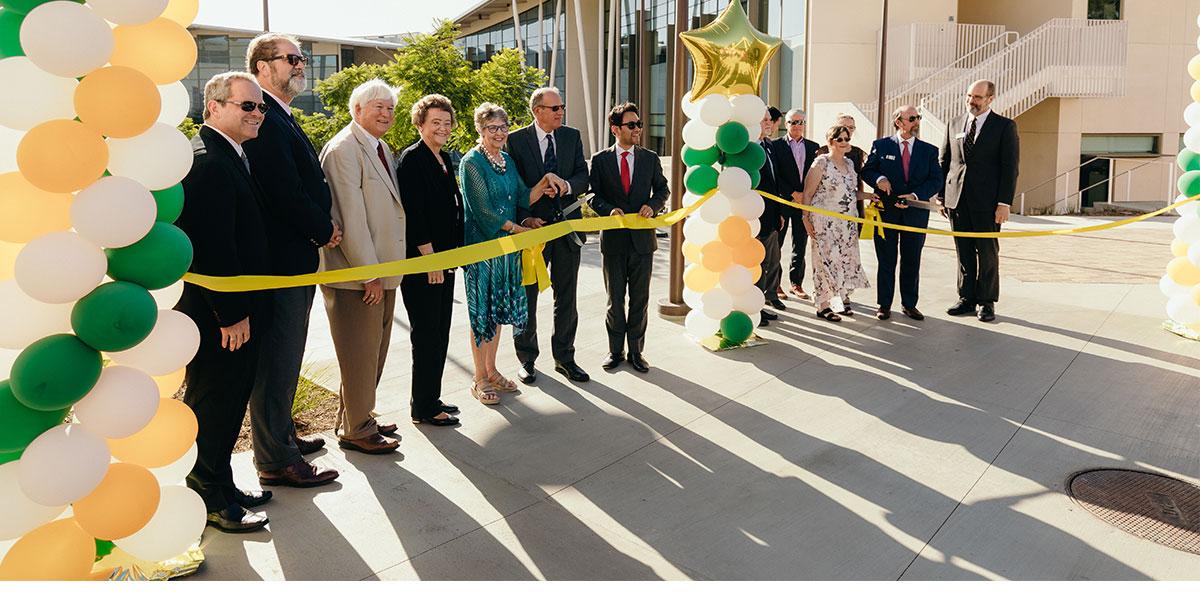 CUI Faculty & Staff and Friends Cutting Ribbon for BMC Opening